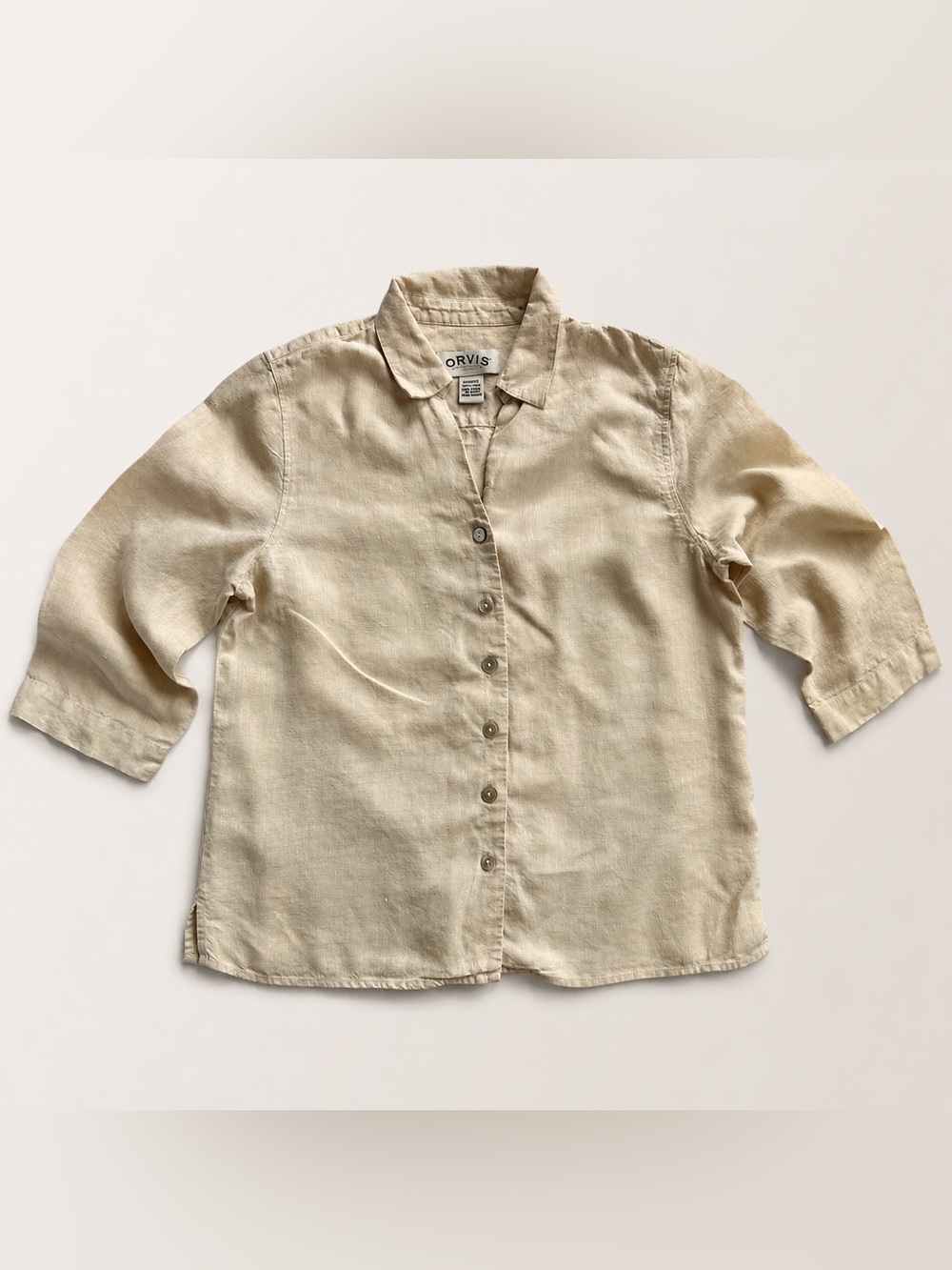 100% linen Orvis button down shirt in a light butter yellow color, women’s sz M